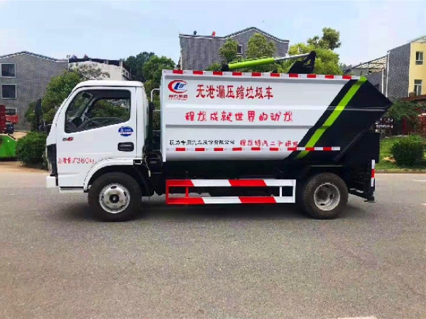 東風小多利卡國六藍牌無泄漏自裝卸(掛桶)式垃圾車